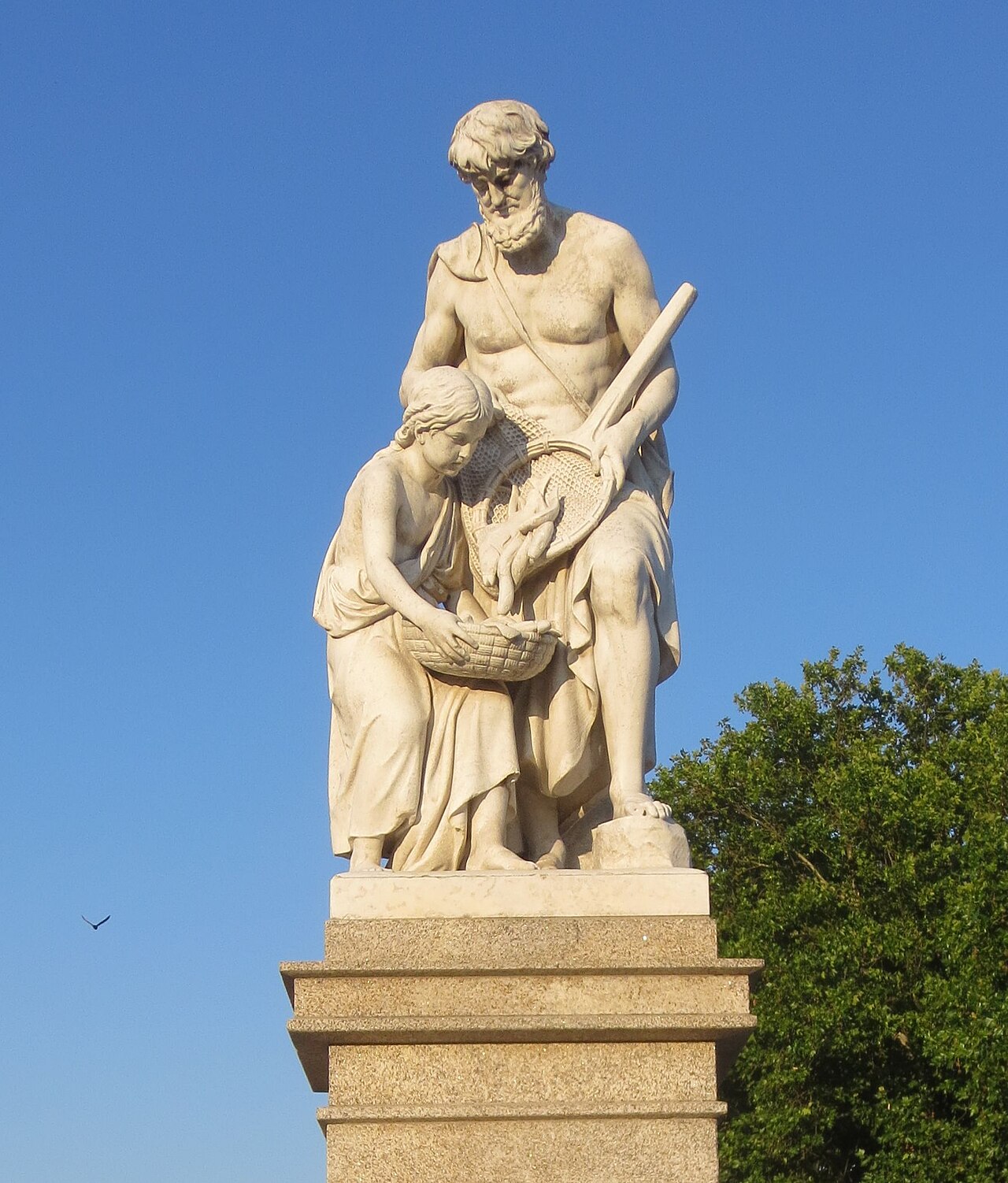 The allegorical sculpture "Fishing" on Hallesche-Tor-Brücke in Berlin-Kreuzberg