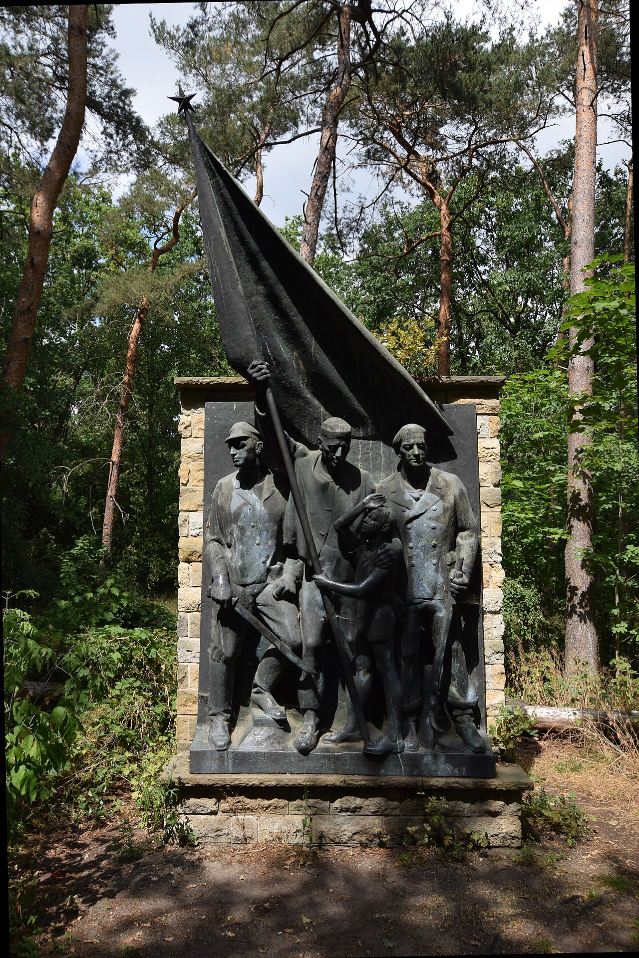 Relief "Aus der Asche unserer Toten keimt die neue Saat" by Hans Kies at the FEZ in Berlin, Germany