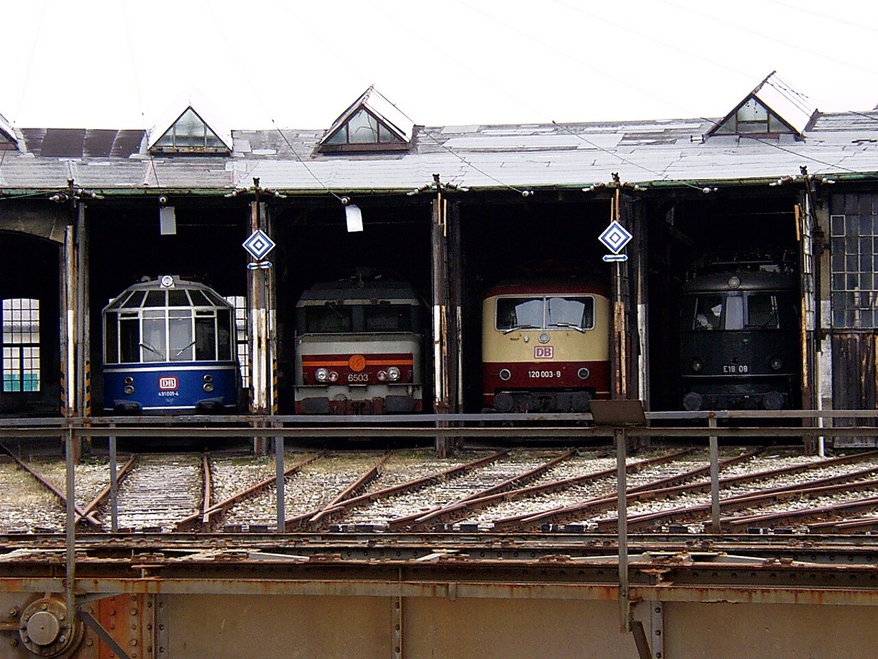 A parade of locomotives in the Europa Roundhouse at the Augsburg Railway Park, Bavaria, Germany