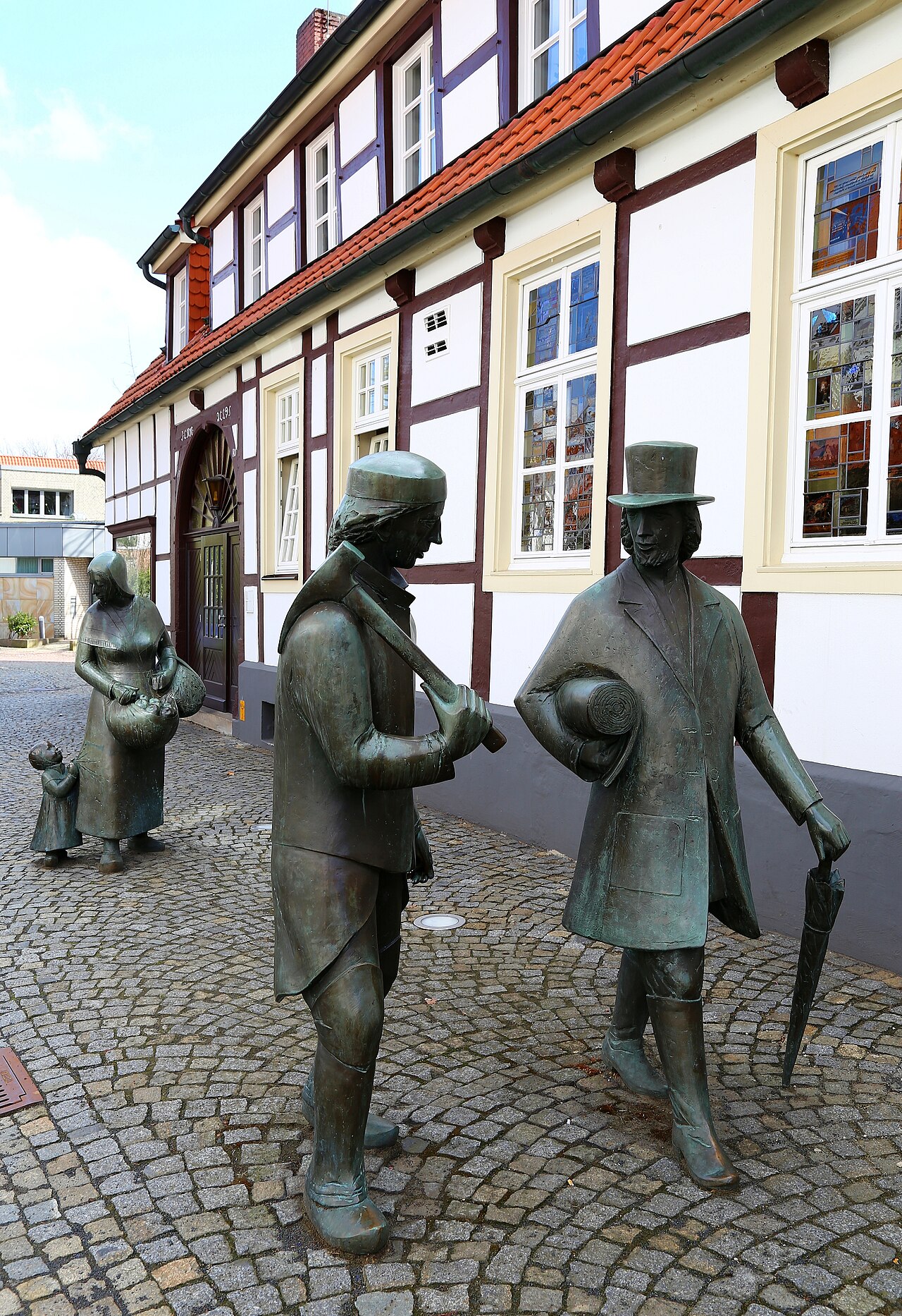 Foto von Bergmann, Tüötte und Bäuerin mit Kind