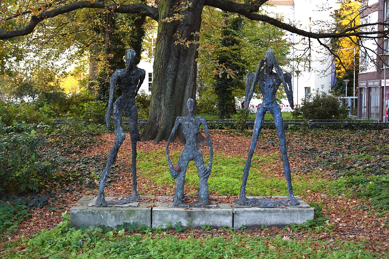 Sculpture group "Sieben Gesten des aufrechten Ganges" by Sabina Grzimek at Garnisonkirchplatz in Berlin-Mitte, Germany