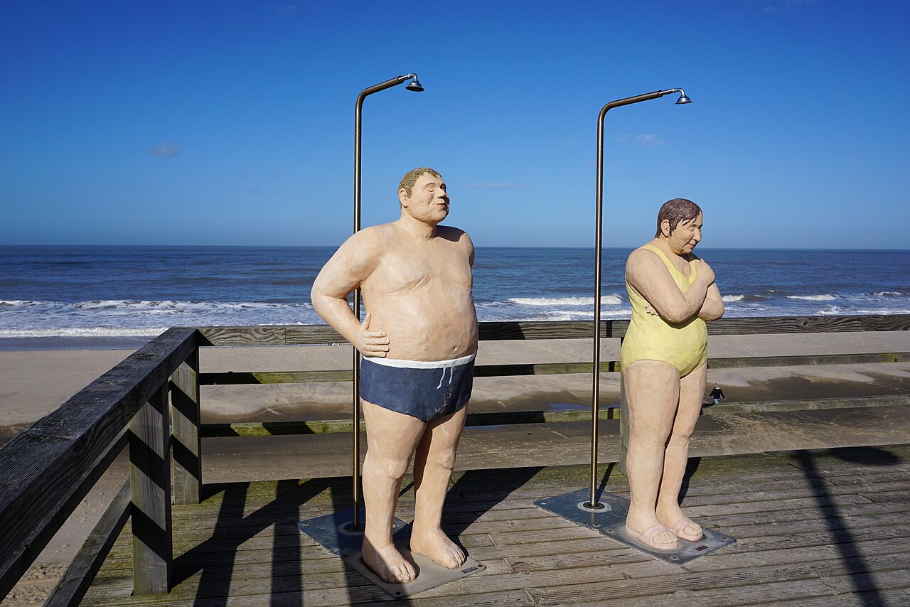 Conrete sculptures Die Duscher (having a shower) in Wenningstedt on Sylt island