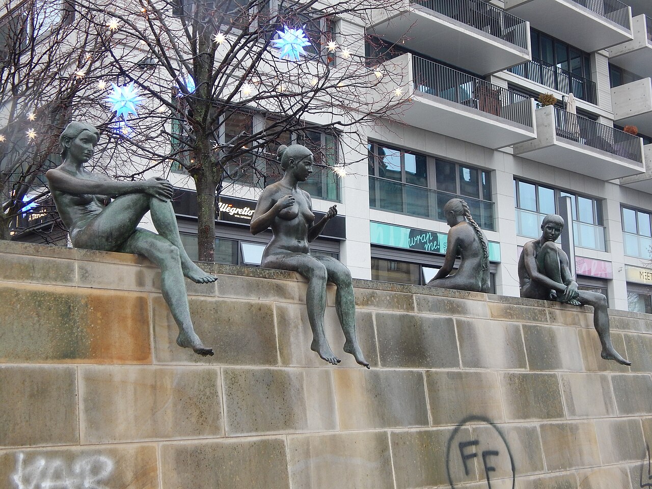 Three girls and a boy by Wilfried Fitzenreiter