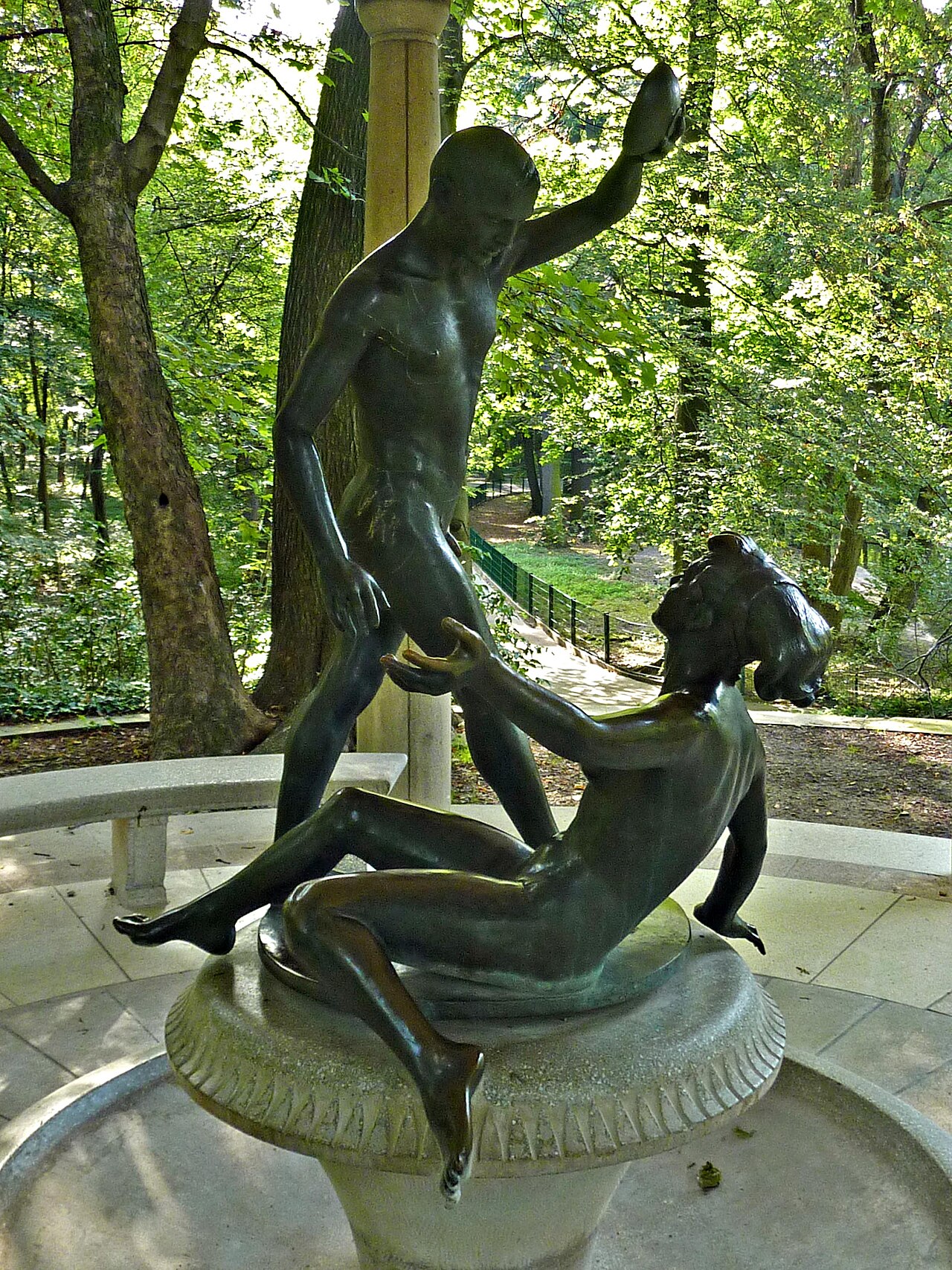 A bronze sculpture, made by Senta Baldamus in 1961, atop a fountain in the Tierpark in Berlin