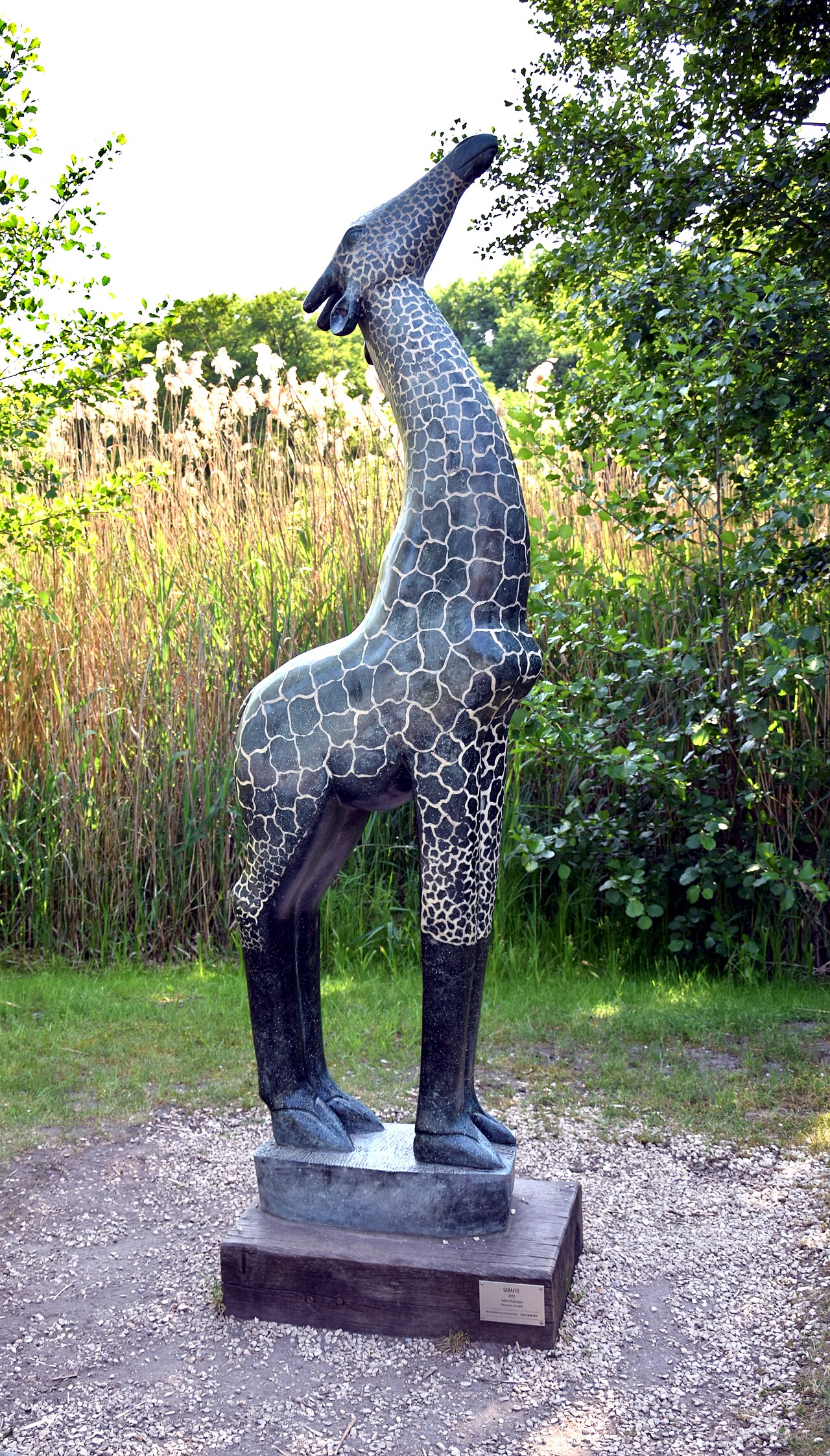Sculpture "Giraffe" by Sidney Majengwa in Tierpark Berlin, Germany