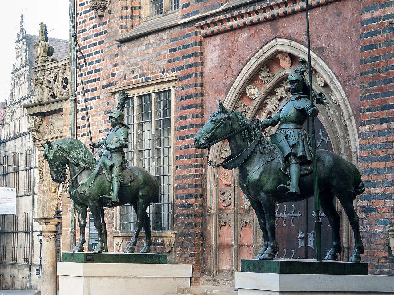 Heralds at the southeast portal of Bremen City Hall, Germany