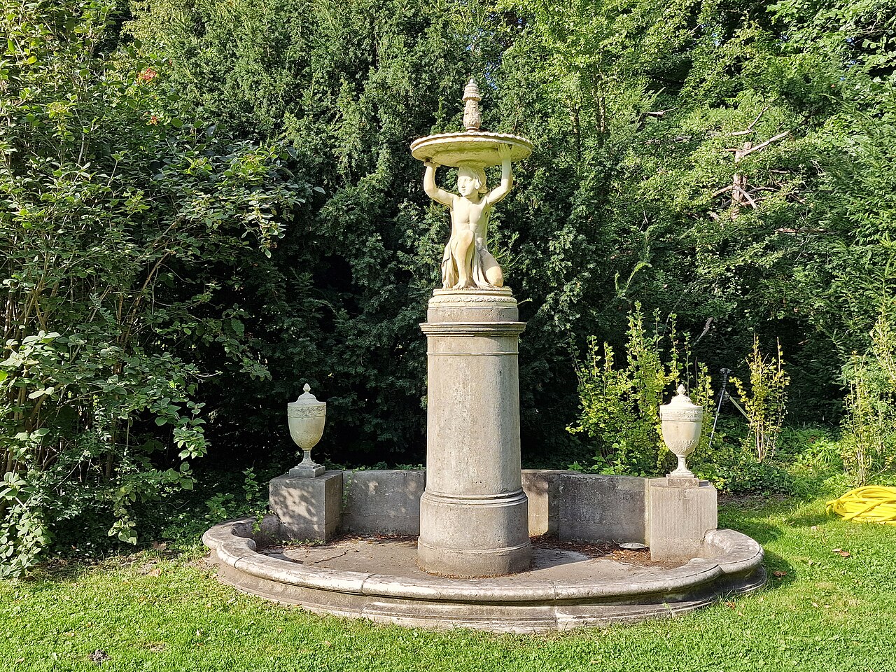 Fountain with kneeling boy in Pleasureground in Klein-Glienicke, Berlin-Wannsee