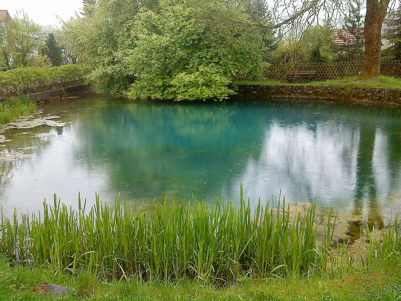 Karst spring of river Lone , Swabian Alb in Urspring, Germany