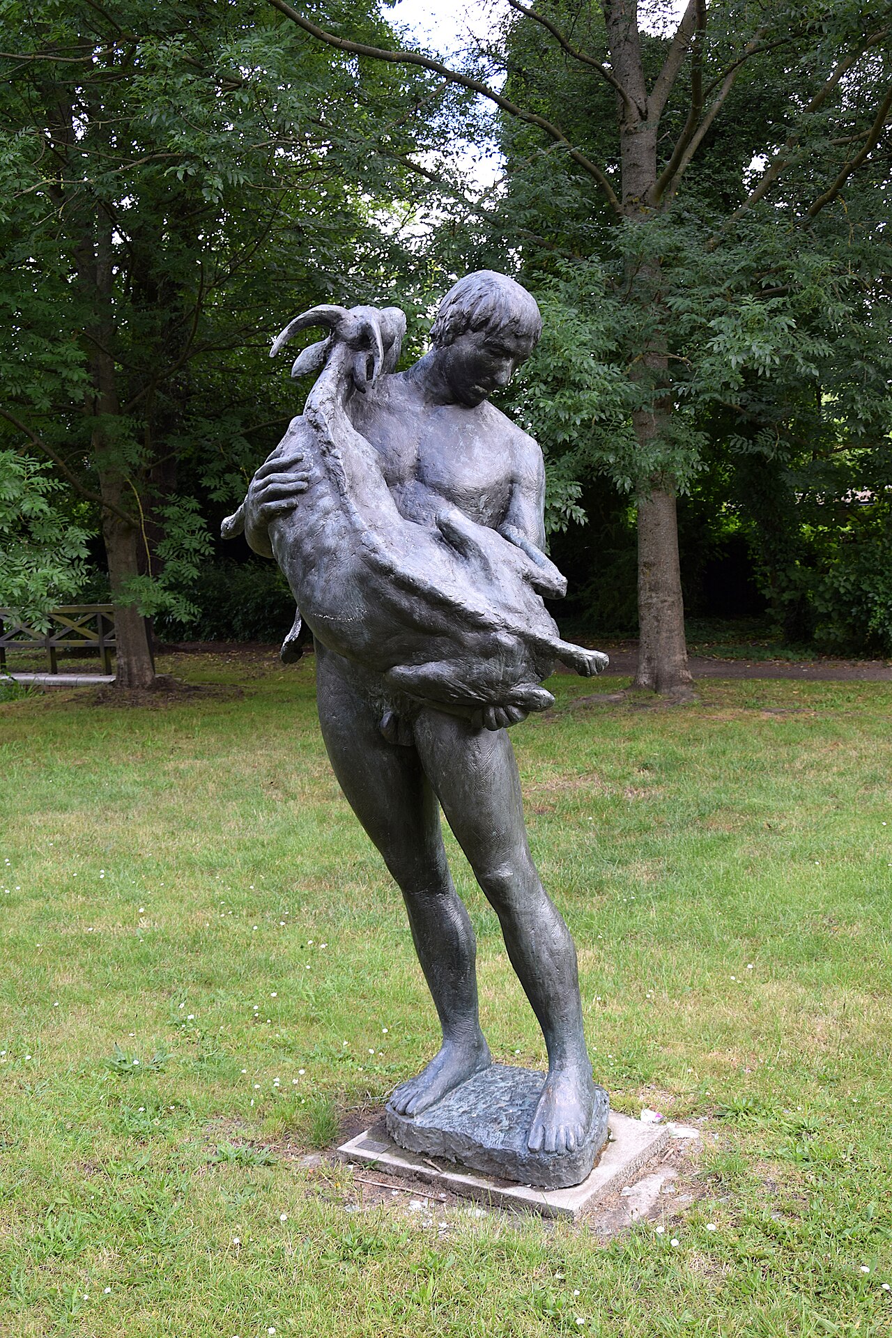 Sculpture "Man with goat" by Friedrich Schötschel in the Goethepark in Bernau bei Berlin, Brandenburg, Germany