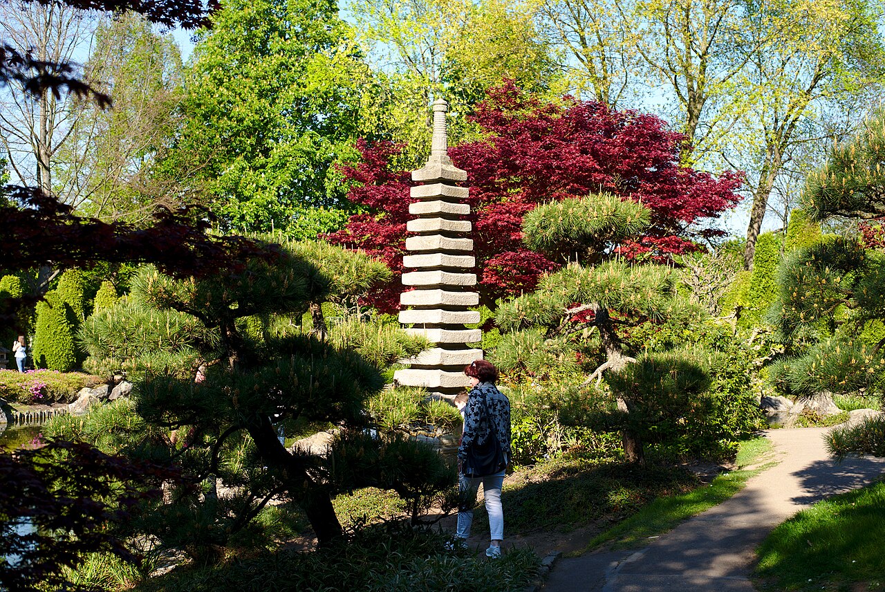 The sculpture of a pagoda in the Japanese garden in the Rheinaue of Bonn