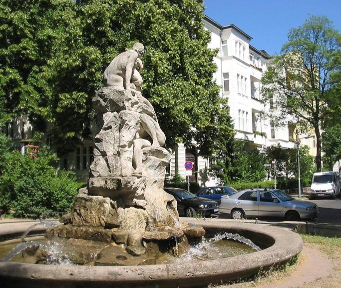 Fountain „Sintflutbrunnen“ (german for „Delugefountain“) at the Perelsplatz in Berlin-Friedenau