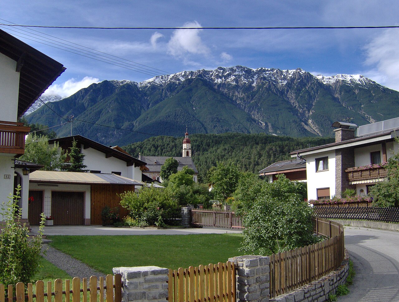 The snow covered mountain Rauchberg in July 2007, seen from Tarrenz, Tyrol, Austria