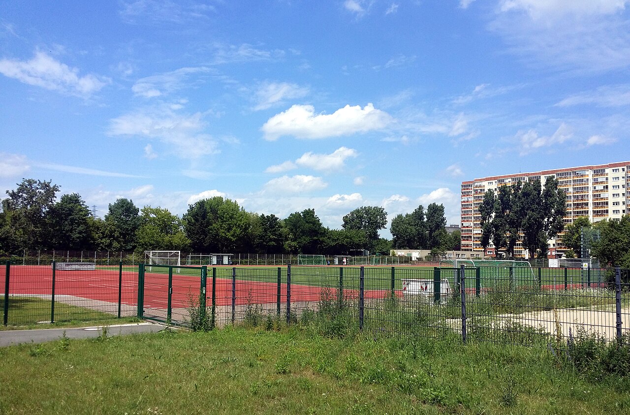 Sports ground Walter-Felsenstein-Straße in Berlin-Marzahn as seen from Alfred-Döblin-Straße