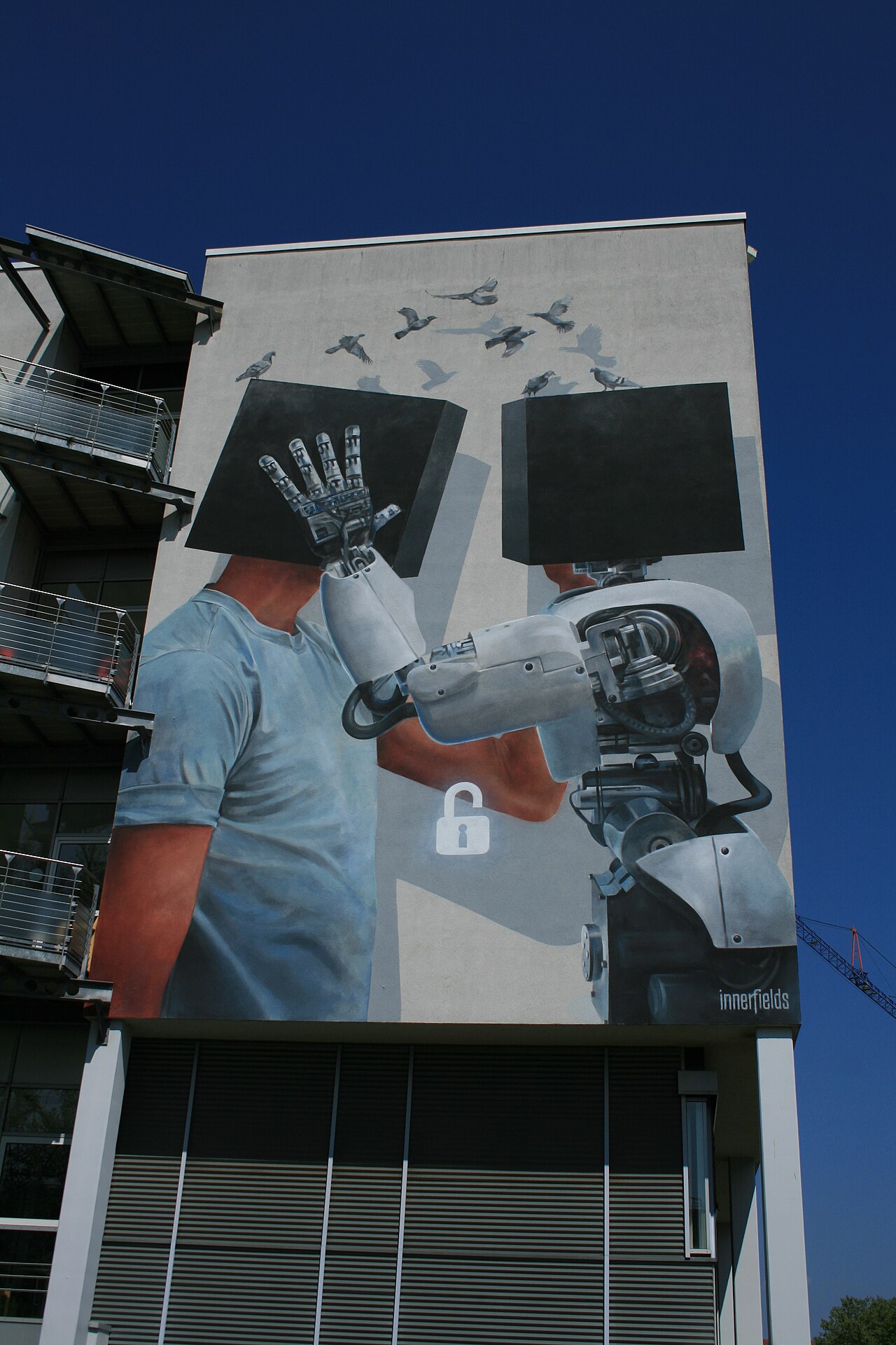 Mural Sympathy by innerfields at the facade of the Neurozentrum Freiburg